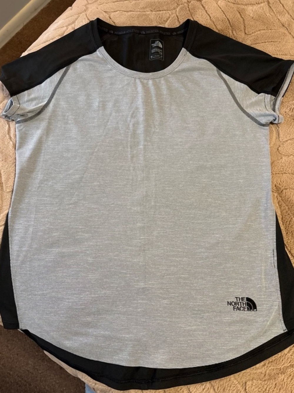 Bundle of workout tops Under Armour North Face